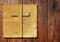 Old vintage Christian paper cross on wood