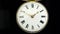 Old vintage clock mechanism watch time going fast . Black background. Sound