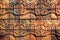 Old vintage earthenware wall tiles patterns handcraft from thailand public.