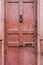 Old vintage english style red salmon pink front door with age re