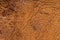 Old vintage genuine soft brown leather texture background, top layer with pores and scratches, macro, close-up