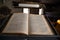 Old Vintage German Bible on Pulpit in European Medieval Church Close up Blurred Background and Copy Space.