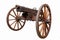 Old vintage gunpowder cannon on wooden carriage with large wheels isolated