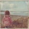 Old Vintage Polaroid. Little girl in a pink jacket by the sea. Photo in old image style. Childhood memories.