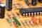 Old vintage printed circuit board with electronic components. Closeup with shallow DOF.