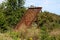 Old vintage rusted gravel sand sieve screen mesh held together with strong metal frame left at abandoned construction site