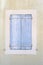 Old vintage rustic blue closed windows shutters French style arc