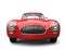 Old vintage scarlet red sports car - front view closeup shot