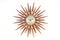 Old vintage star or sun burst shaped wooden wall clock