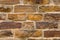 Old vintage stone wall from brown medieval stone