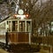 Old vintage tramway car on the night city street. Moscow