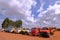 Old vintage trucks of various colors and models in row on a truck stop in the Chapada Diamantina region, Bahia, Brazil