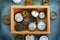 Old vintage watches in wooden box. Watch repair workshop background. Time concept.