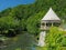 Old, vintage watchtower on the shore of Cerna river, in Baile Herculane