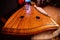 Old vintage wooden carved Gusli Russian folk instrument, close up view