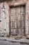 Old vintage wooden door in Old Town in decay