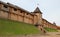 Old vintage wooden houses and citadel, ancient architecture of Kiev, park Kyivan Rus