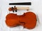 Old violin restoration: detached fingerboard and body with head