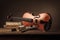 Old violin still life with books