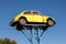 Old Volkswagen Beetle as Junkyard Sign