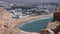 Old wall and Moroccan city beach