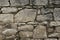 Old wall of travertine (calcareous tufa)