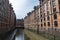 Old warehouses next to a canal in HafenCity, Hamburg, Germany