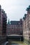 Old warehouses next to a canal in HafenCity, Hamburg, Germany