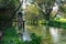 Old water mill, water wheel on a river in countryside