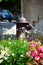 Old water pump and flowers, Castle Combe.