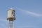 Old water tank on a tower.