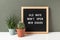 Old Ways Won`t Open New Doors. Motivational quote on letter board, cactus, succulent flower on white table. Concept