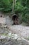 Old weathered area of stone and metal entrance to historic Lockport Caves, New York, 2018.