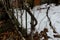 Old weathered banister handrail on brick steps