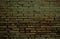 Old weathered clay brick background texture