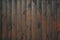 Old weathered distressed dark brown wooden boarding wood texture background, dark brown plank fence background
