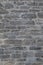 Old weathered granite stone wall textured natural background