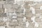 Old and weathered gray concrete block or cinder breeze block brick wall texture background