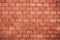 Old and weathered grungy red brick wall texture background