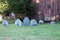 Old weathered headstone in amongst others, The Burying Point, Salem, Massachusetts, 2018