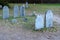 Old weathered headstones on the grounds of The Burying Point, Salem Mass, 2018