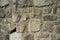 Old and Weathered Natural Stone Tile Wall