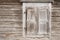 Old weathered traditional wooden window shutters.