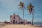 An old weathered white washed church on the beach of the Island of Mozambique