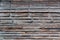 Old weathered wooden wall. Vintage timber blocking architectural background