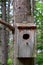 Old weathered worn bird house