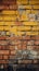 Old and weathered yellow and red brick wall, seamless pattern backdrop