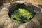 Old well in a poor village peasants