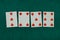 Old west era playing card on gambling table. 3,4,5,6 of hearts