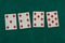 Old west era playing card on gambling table. 5,6,7,8 of diamonds